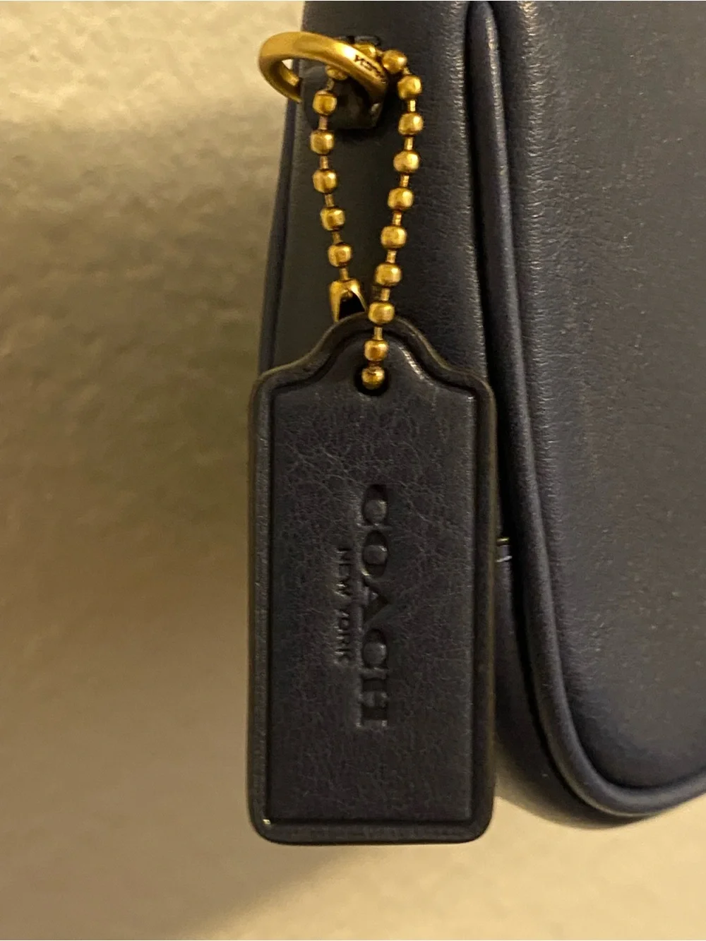 Coach Navy Pebbled Leather Mini Wristlet with Gold Hardware